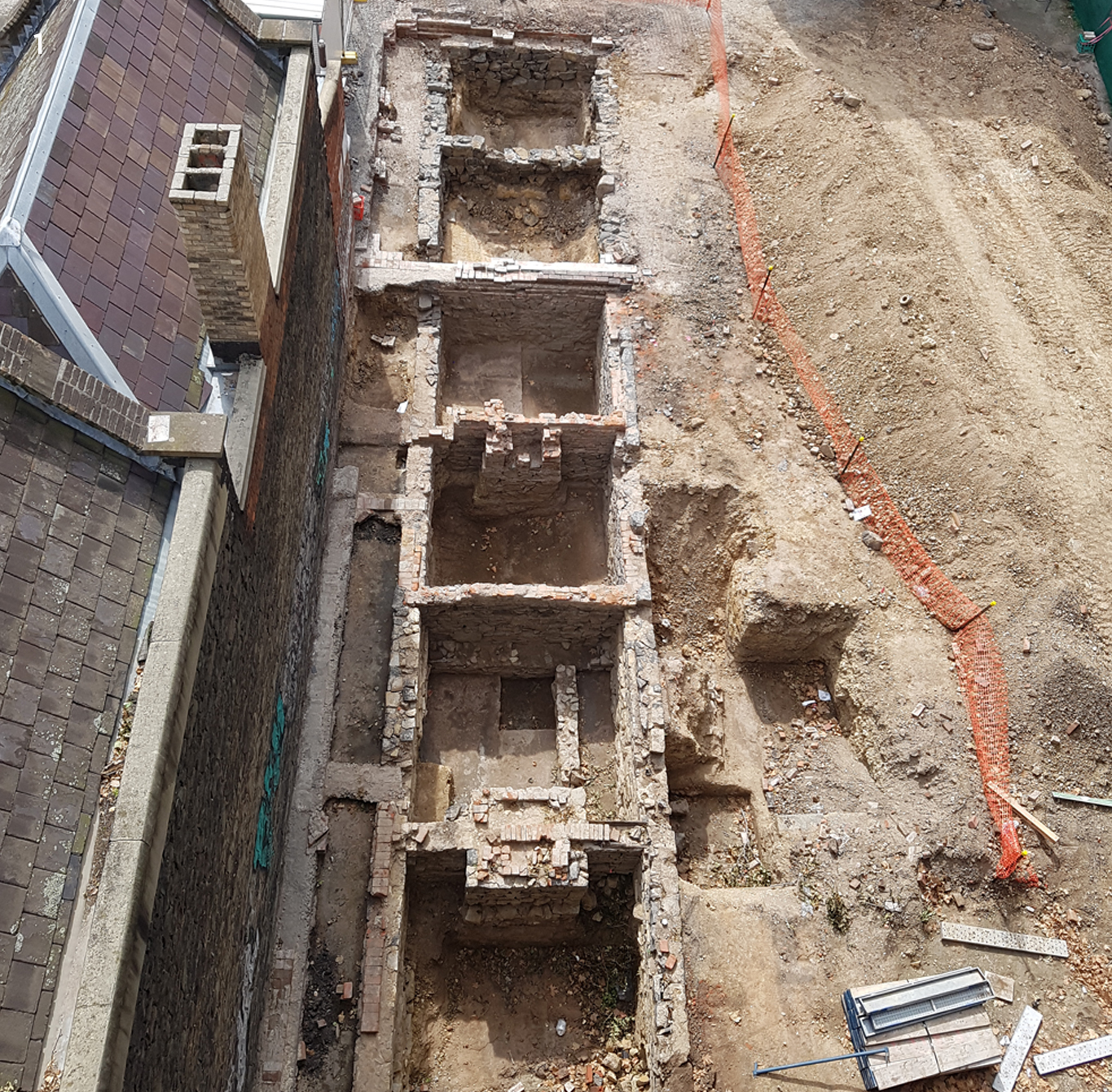 Six of the small residences along Jones Lane, beside the Wesley Church Manse, after excavation in 2017.