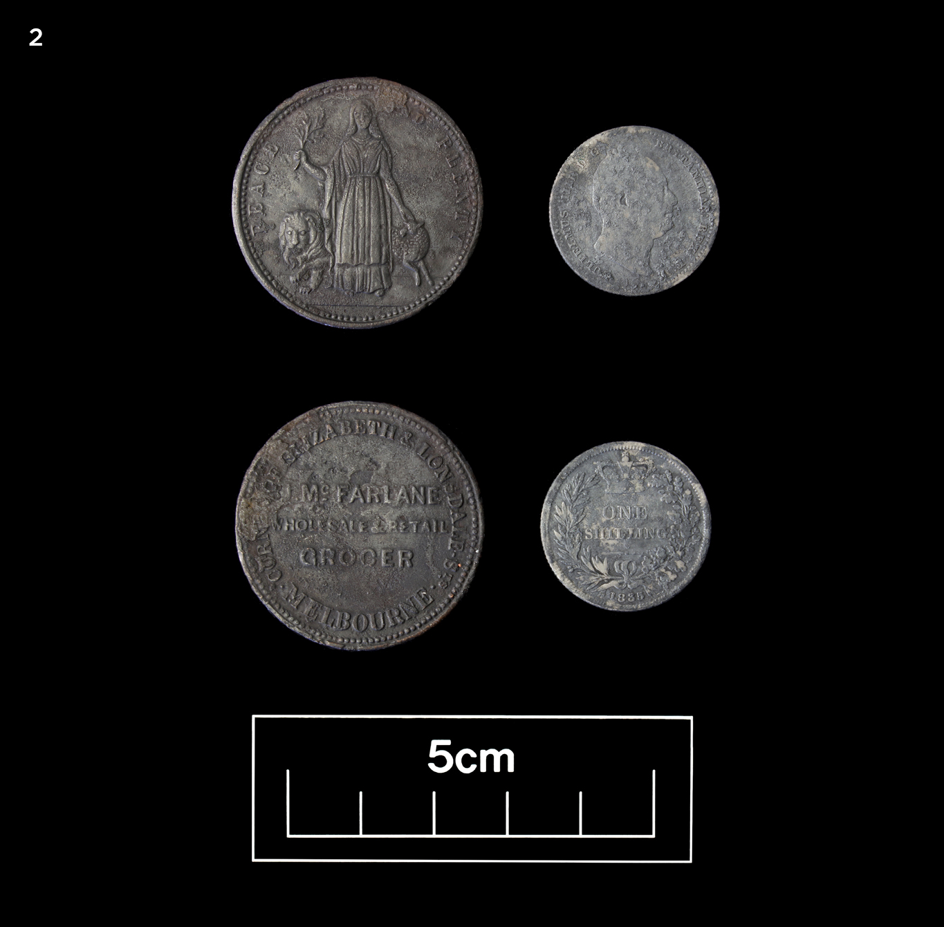 An 1835 British shilling and retailer’s token both found at a Jones Lane residence. 