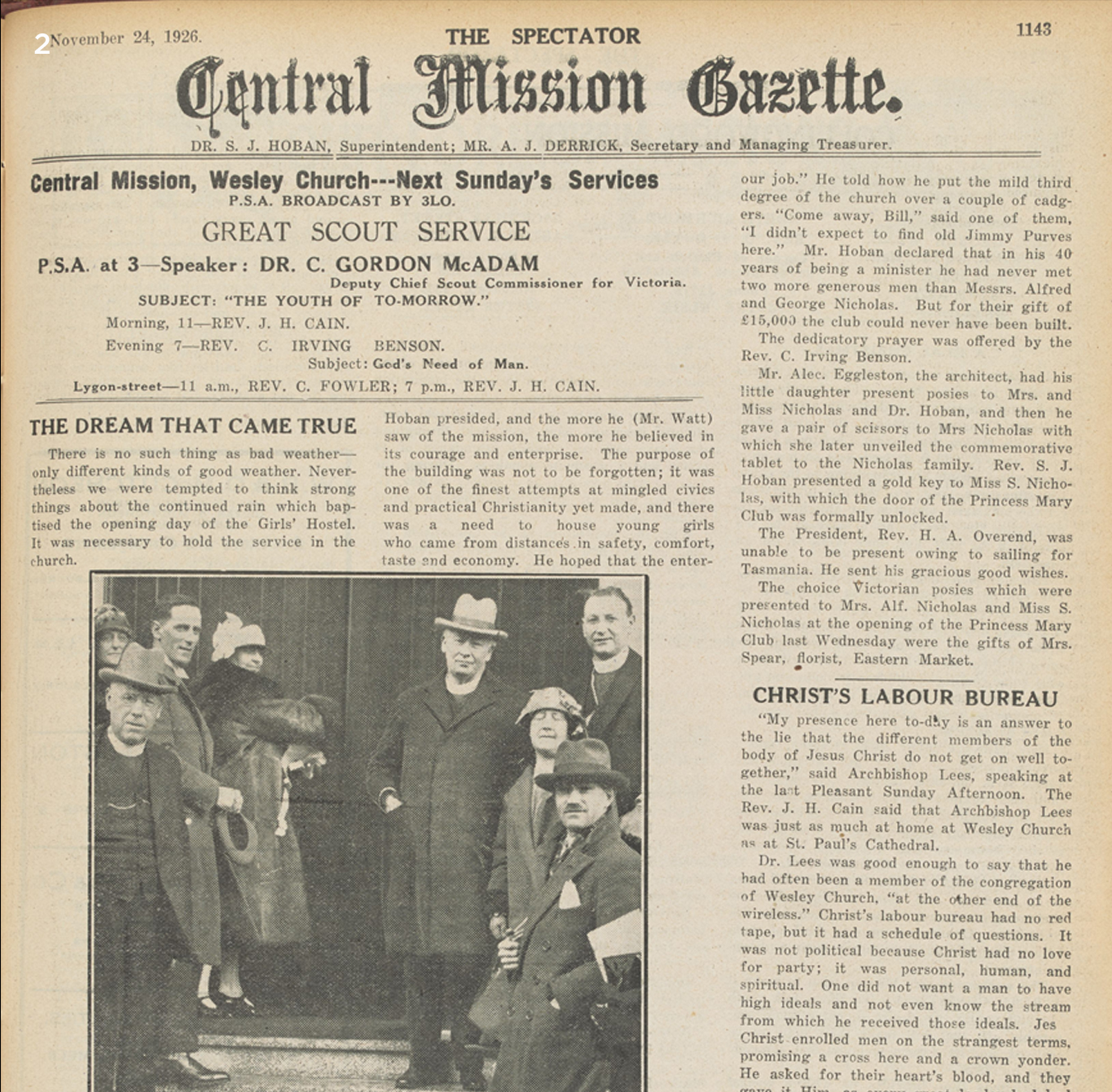 Miss S Nicholas inserting the gold key in the door to officially open the Princess Mary Club.